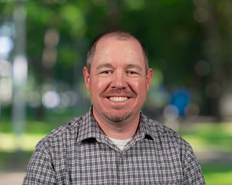 Headshot of Adam French